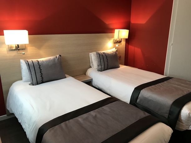 Imagen de la habitación del Hotel Logis Cris , Lyon Sud. Foto 18
