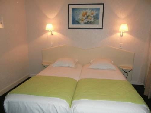 Imagen de la habitación del Hotel Logis De La Paix, Saint Nectaire. Foto 10