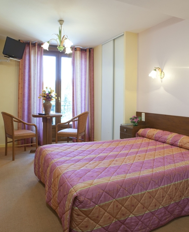 Imagen de la habitación del Hotel Logis Des Sapins. Foto 13