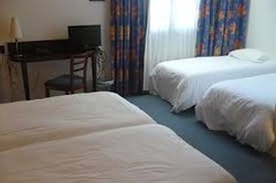Imagen de la habitación del Hotel Logis Du Beffroi. Foto 3