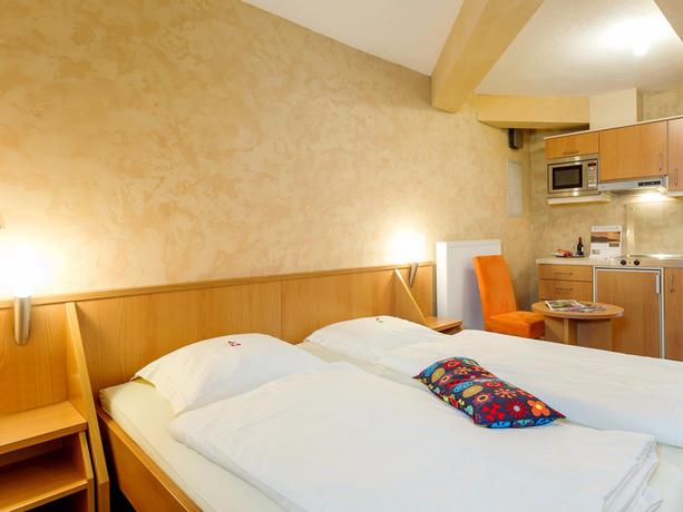 Imagen de la habitación del Hotel Logis Gourmet & Relax Wellness Hotel De La Sure. Foto 6