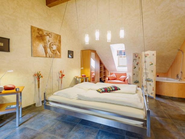 Imagen de la habitación del Hotel Logis Gourmet & Relax Wellness Hotel De La Sure. Foto 9