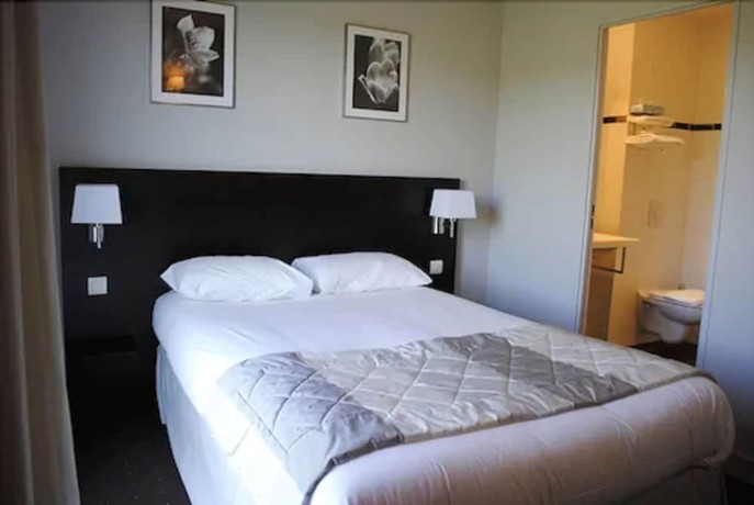 Imagen de la habitación del Hotel Logis H&ocirc;tel Ali&eacute;nor. Foto 9