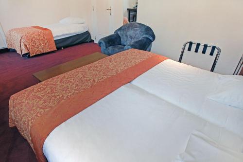 Imagen de la habitación del Hotel Logis H&ocirc;tel Le Menobu. Foto 19