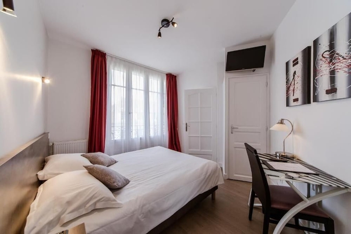 Imagen de la habitación del Hotel Logis H&ocirc;tel - Le Petit Bellon. Foto 8