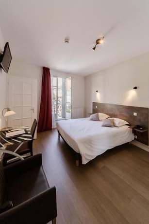 Imagen de la habitación del Hotel Logis H&ocirc;tel - Le Petit Bellon. Foto 10