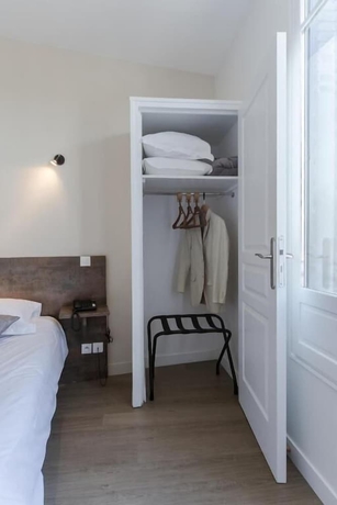 Imagen de la habitación del Hotel Logis H&ocirc;tel - Le Petit Bellon. Foto 13