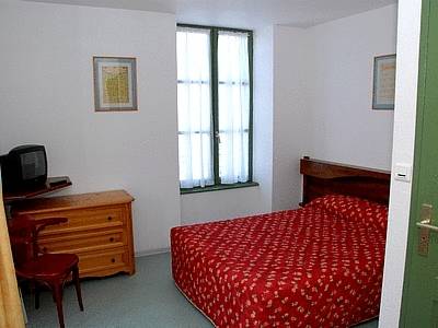 Imagen de la habitación del Hotel Logis H&ocirc;tel Le Relais Des Remparts. Foto 5