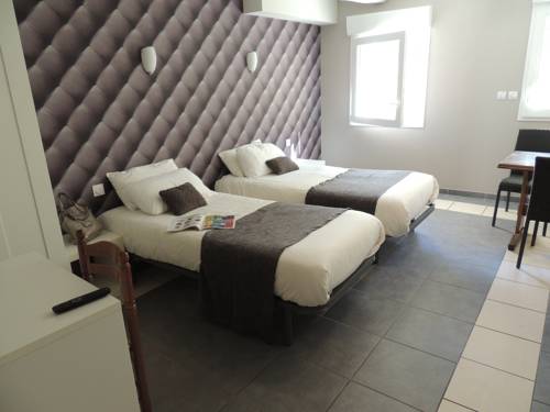 Imagen de la habitación del Hotel Logis H&ocirc;tel Les Coudercous. Foto 16