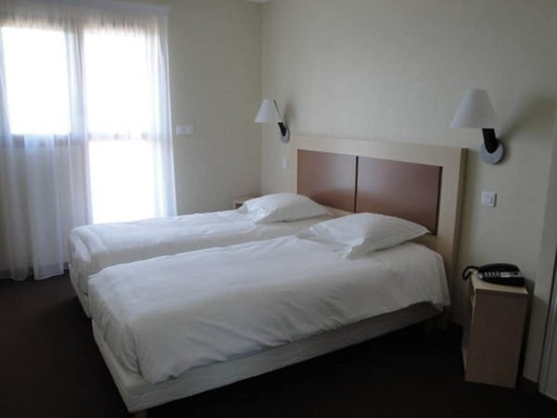 Imagen de la habitación del Hotel Logis H&ocirc;tel Talencia. Foto 2
