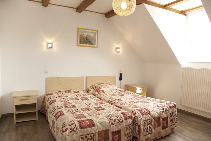 Imagen de la habitación del Hotel Logis Hôtel à l\'Etoile d\'Or. Foto 7