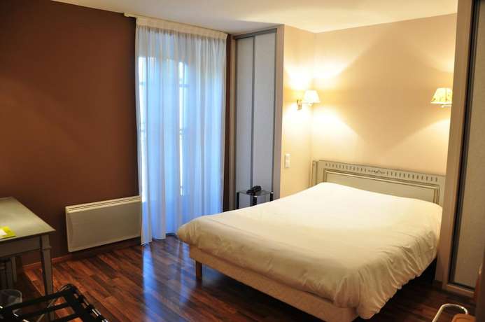 Imagen de la habitación del Hotel Logis H&ocirc;tel du Parc, Le Fraysse. Foto 7