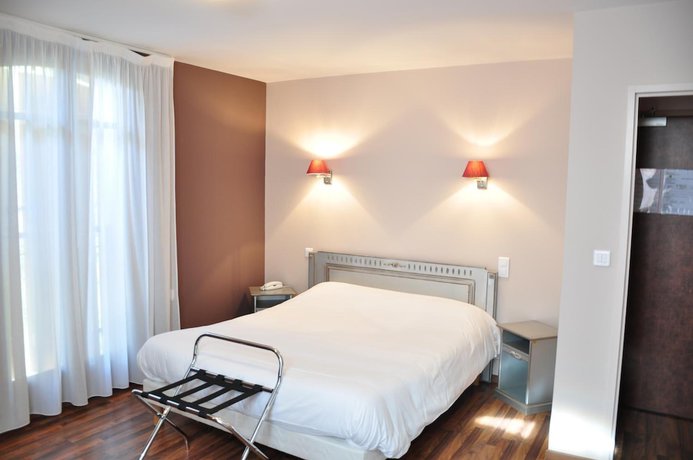 Imagen de la habitación del Hotel Logis H&ocirc;tel du Parc, Le Fraysse. Foto 13