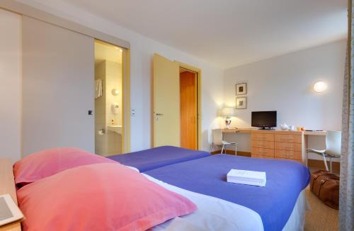 Imagen de la habitación del Hotel Logis H&ocirc;tel et Restaurant La Pension du Moulin. Foto 6