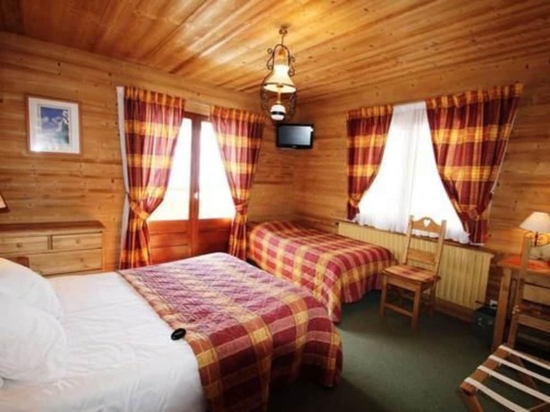 Imagen de la habitación del Hotel Logis Hôtel la Cremaillère. Foto 16