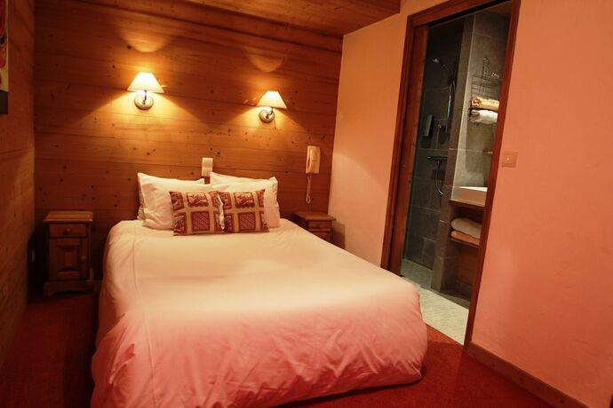 Imagen de la habitación del Hotel Logis Hôtel la Cremaillère. Foto 18