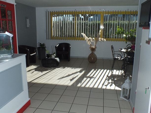 Imagen de los interiores del Hotel Logis Hôtel le Clos Saint-Loup. Foto 12