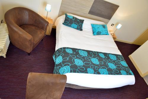 Imagen de la habitación del Hotel Logis Hostellerie De L'abbaye. Foto 7