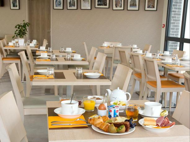 Imagen del bar/restaurante del Hotel Logis - La Chambre D'amiens. Foto 2