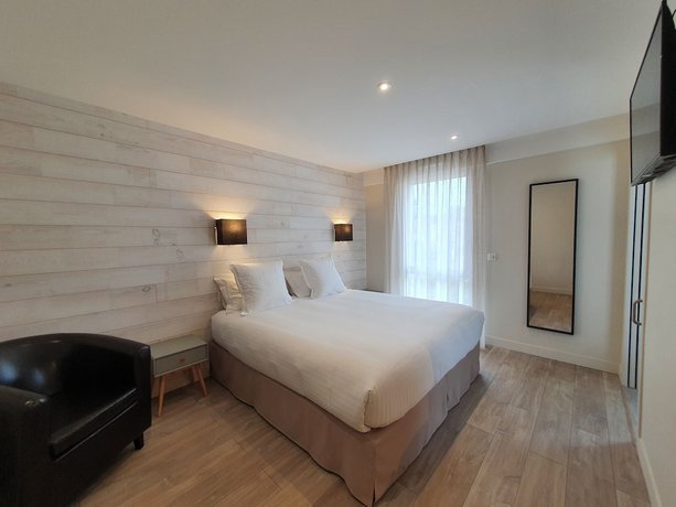 Imagen de la habitación del Hotel Logis La Closerie. Foto 13