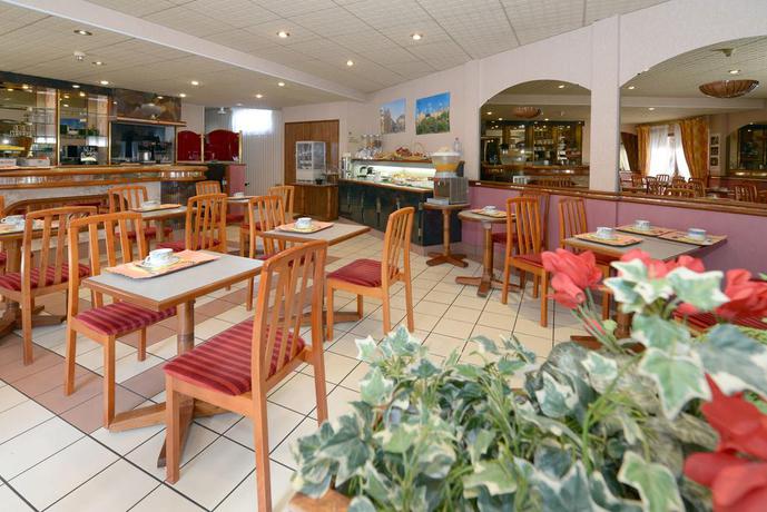 Imagen del bar/restaurante del Hotel Logis Le Cheval Blanc Et Clovis. Foto 3