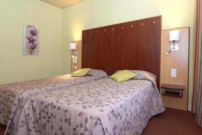 Imagen de la habitación del Hotel Logis Le Cheval Blanc Et Clovis. Foto 4