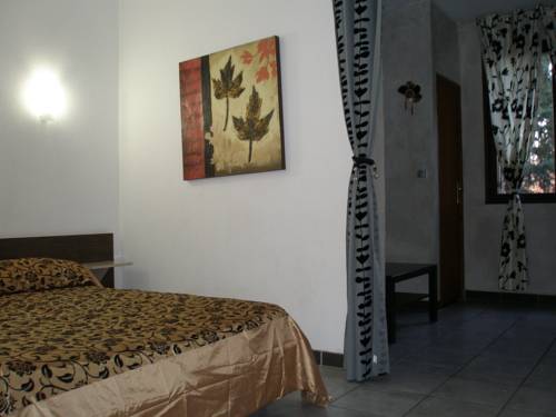 Imagen de la habitación del Hotel Logis - Le Clement V. Foto 3