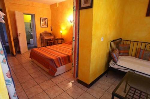 Imagen de la habitación del Hotel Logis - Le Clement V. Foto 5