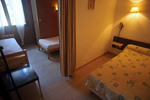 Imagen de la habitación del Hotel Logis - Le Clement V. Foto 11