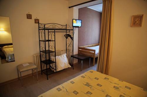 Imagen de la habitación del Hotel Logis - Le Clement V. Foto 13