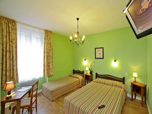 Imagen de la habitación del Hotel Logis Le Cygne. Foto 13