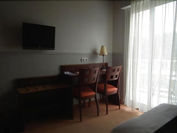 Imagen de la habitación del Hotel Logis Le Moulin Neuf. Foto 10