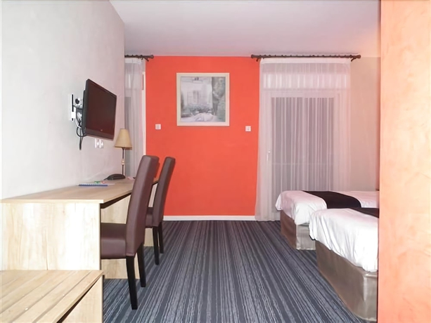 Imagen de la habitación del Hotel Logis Le Moulin Neuf. Foto 11