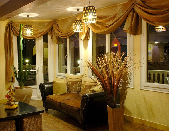 Imagen de los interiores del Hotel Logis Le Moulin Neuf. Foto 13