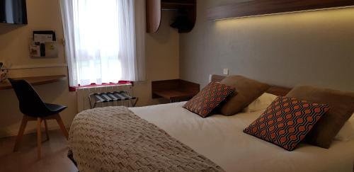 Imagen de la habitación del Hotel Logis Le Sainte Mere. Foto 7