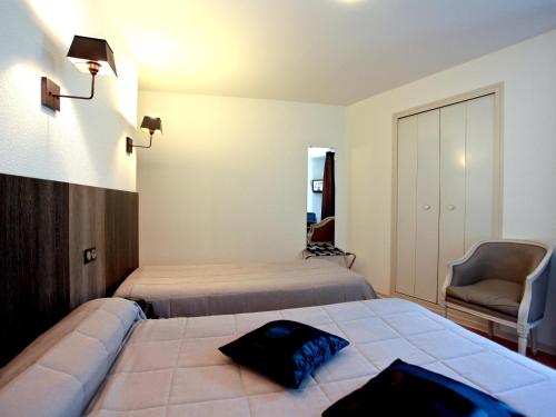 Imagen de la habitación del Hotel Logis Le Victor Hugo. Foto 6