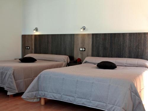 Imagen de la habitación del Hotel Logis Le Victor Hugo. Foto 9