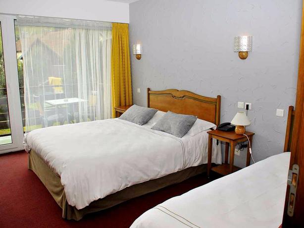 Imagen de la habitación del Hotel Logis Les Chatelmin&eacute;s. Foto 13