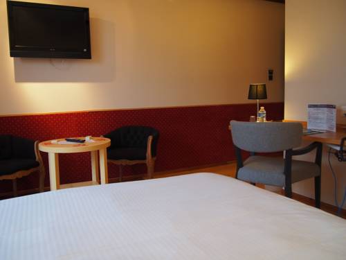 Imagen de la habitación del Hotel Logis Les Pages. Foto 6