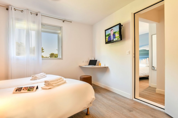 Imagen de la habitación del Hotel Logis Les Vagues. Foto 9