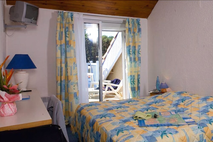 Imagen de la habitación del Hotel Logis Les Vagues. Foto 13