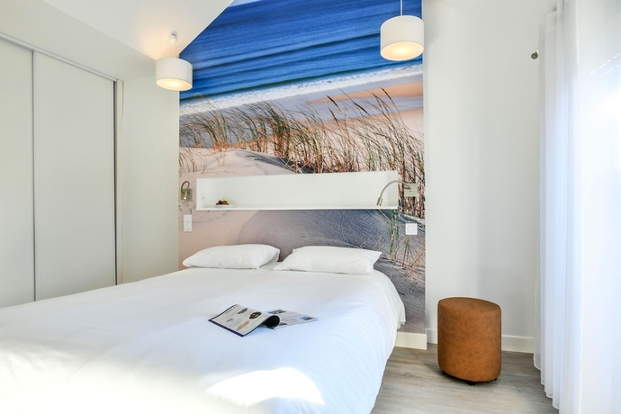 Imagen de la habitación del Hotel Logis Les Vagues. Foto 14