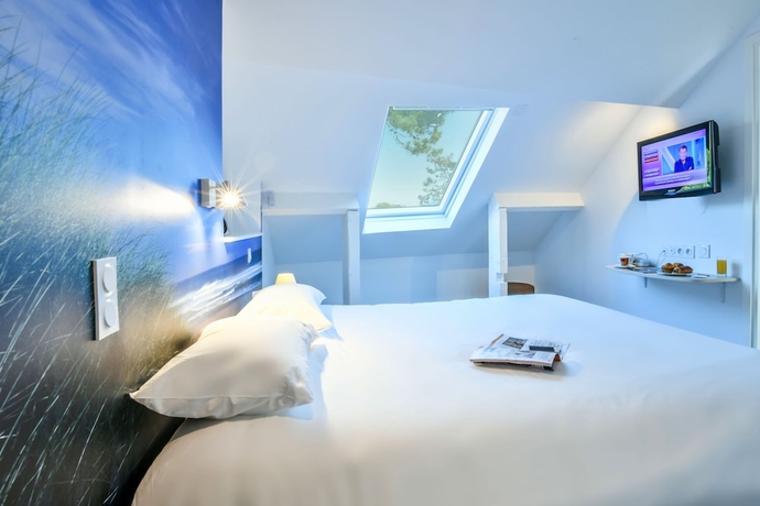 Imagen de la habitación del Hotel Logis Les Vagues. Foto 16