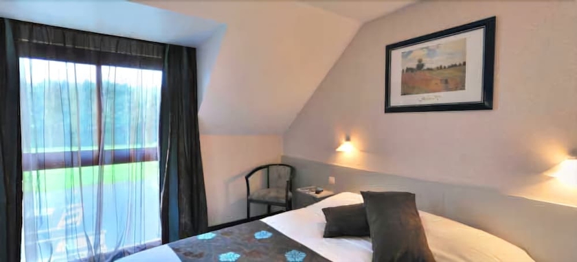 Imagen de la habitación del Hotel Logis Lucotel. Foto 10