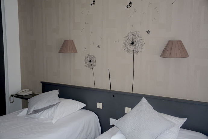 Imagen de la habitación del Hotel Logis Maisons Glenn Anna L'auberg'ine. Foto 11