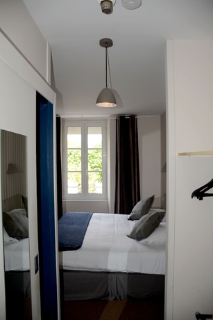 Imagen de la habitación del Hotel Logis Maisons Glenn Anna L'auberg'ine. Foto 12