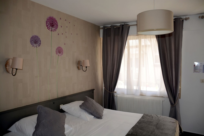 Imagen de la habitación del Hotel Logis Maisons Glenn Anna L'auberg'ine. Foto 16