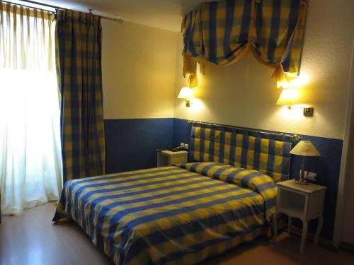 Imagen de la habitación del Hotel Logis Moderne Et Pigeon. Foto 4