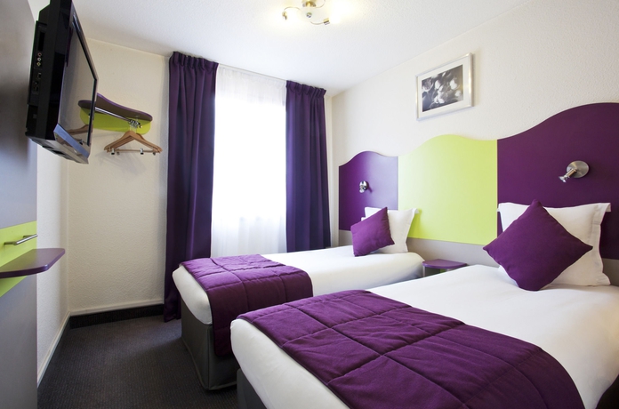 Imagen de la habitación del Hotel Logis Noemys Pont De L'etoile. Foto 9