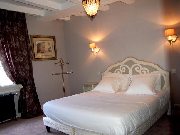 Imagen de la habitación del Hotel Logis Restaurant Le Cheval Blanc. Foto 7